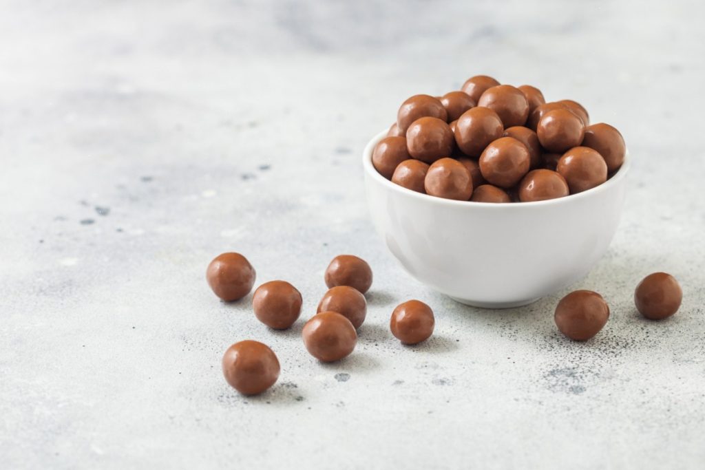 A collection of mushroom chocolate kept on a bowl