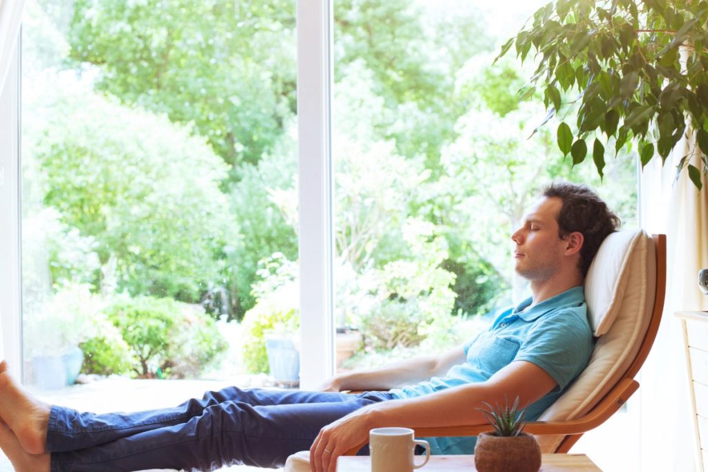 A guy relaxing after consuming psilocybin mushrooms