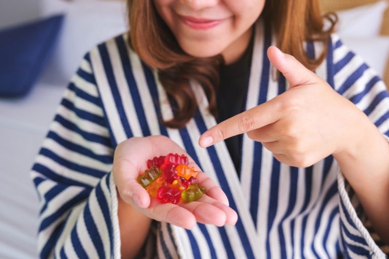 A lady is showing best magic mushroom gummies