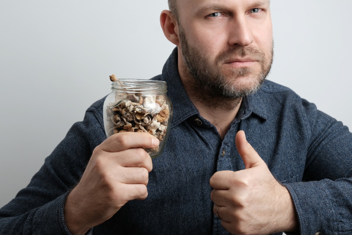 A person suggesting mushrooms for daily use